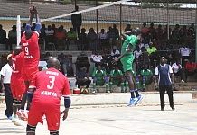 Hon Kim Gai of EALA spikes the ball past Parliament of Kenya  who carried the day 3sets to 1