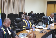The Speaker of EALA, Rt. Hon. Ngoga K. Martin (middle) flanked by the Senior Clerk Assistant, Mr. Asheri Wimile and the Clerk Assistant, Mr. Victor Manzi, Clerks-at-Table during the Special Virtual Sitting to reconsider the EAC Appropriation Bill, 2020