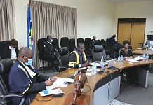 The Speaker of EALA, Rt. Hon. Ngoga K. Martin (middle) flanked by the Senior Clerk Assistant, Mr. Asheri Wimile and Hon Josephine Lemoyan, during the Virtual Sitting