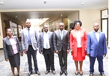 Speaker poses for a photo with the Members of the Regional Integration Committee. To the right of the Speaker is Hon Janet Ongera and Hon Basil Tandaza.  To the left is Hon Ali Wario, Hon Memusi Kanchory and Committee Clerk, Hellen Lokowam (extreme left)