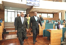 The Deputy Minister for Foreign Affairs and EAC, United Republic of Tanzania, Hon Dr Damas D. Ndumbaro (left) is led to the House by Hon Dr Ngwaru Maghembe, Hon Pamela Massaay and Hon Simon Mbugua(partially hidden)