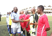 EALA's Hon Julius Wandera Maganda shakes hands with the Burundi Goalkeeper, Hon Ibrahim Uwizeye moments before the game kicked off.  EALA won 7-1