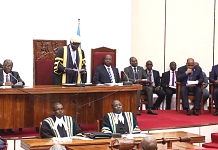EALA Speaker, Rt Hon Ngoga K. Martin addresses the Assembly to invite H.E. John Pombe Joseph Magufuli. On right is the Speaker of the Parliament of Tanzania, Rt Hon Job Y. Ndugai. On extreme right is the Prime Minister of the United Republic of Tanzania,