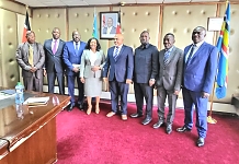Rt. Hon. Speaker of EALA, Joseph Ntakirutimana, flanked by the commissioners pose for a group photo with Cabinet Secretary, Ministry of EAC, Arid and Semi Arid Areas and Regional Integration, Kenya, Ms Rebecca Miano.