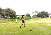 Hon Sarah Kityo teeing off at the Lake Victoria Serena Golf course