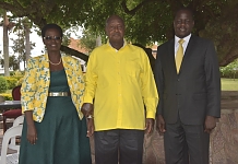 President Yoweri Museveni poses for a picture with Rt Hon Daniel F. Kidega (right). On left is Mrs Winifred Kaliba, staff of EALA