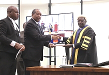 CONGRATULATIONS: EALA Speaker, Rt Hon Ngoga Karoli Martin congratulates the Minister for Foreign Affairs and East African Co-operation, United Republic of Tanzania, Prof Palamagamba Kabudi moments after taking the oath.