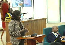 Hon Deng Gai, Chair of the Committee on Communication, Trade and Investment, presents the report on the status of ratification of the amended article 24(2) (a) of the Protocol on the Establishment of the Trade Remedies Committee