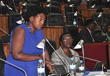 Hon Nancy Abisai, the mover of the Bill on Gender Development and Equality speaks as Hon Dr Odette Nyiramilimo looks on
