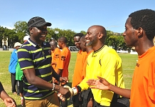 Speaker of EALA, Rt Hon Daniel F. Kidega shakes hands with Hon Ibrahim Uwizeye of the Parliament of Burundi.   Parliament of Burundi beat Parliament of Tanzania 1-0 in soccer to set up a date with Parliament of Uganda