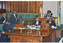 The Chair of Council of Ministers and Minister for State, EAC Affairs, Uganda, Hon Julius Wandera Maganda on the floor of the House