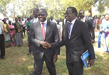 The Speaker of EALA, Rt Hon Daniel F. Kidega (left) is received by the Obongi County MP, Hon Kaps Fungaroo Hassan to the celebrations